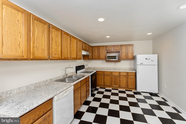 kitchen with white appliances and sink