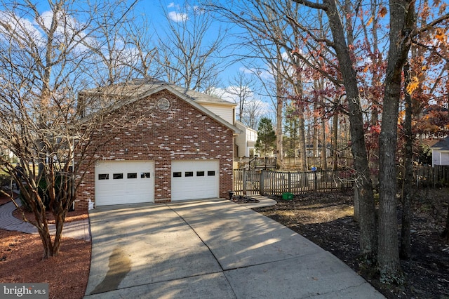 view of home's exterior with a garage