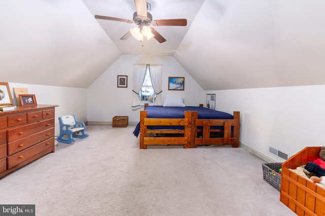 bedroom featuring carpet, ceiling fan, and lofted ceiling