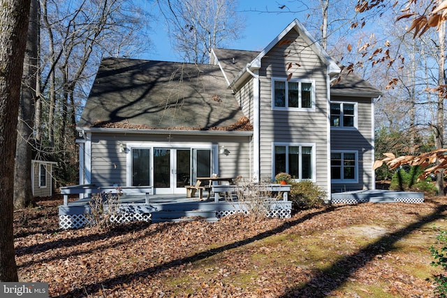 back of property featuring french doors and a deck