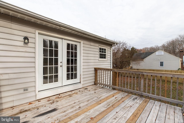 wooden deck featuring french doors