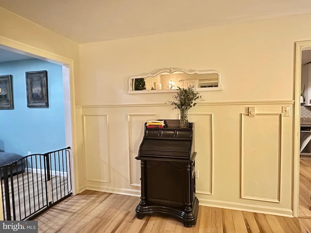 miscellaneous room with light wood-type flooring