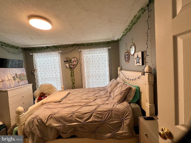 bedroom featuring a textured ceiling