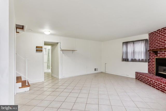 unfurnished living room with a fireplace