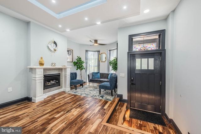 entrance foyer with hardwood / wood-style flooring and ceiling fan