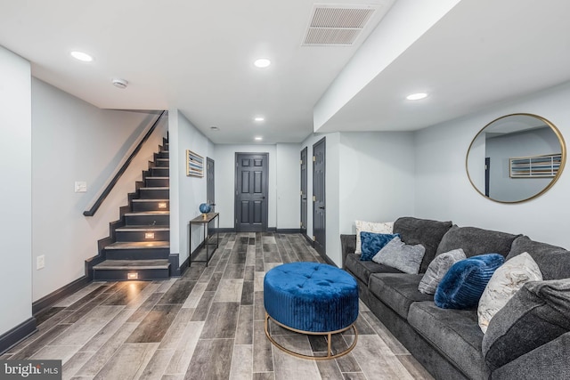 living room with dark hardwood / wood-style floors