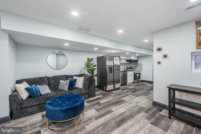 living room with hardwood / wood-style floors