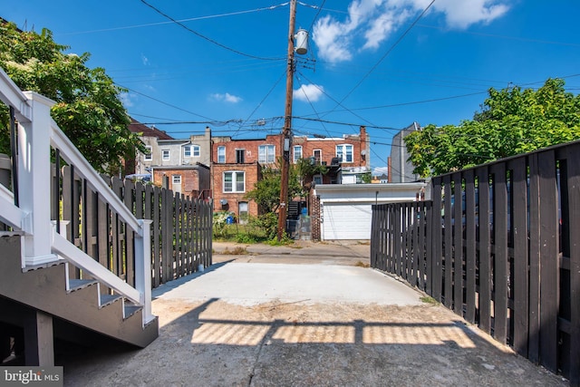 exterior space with an outdoor structure and a garage