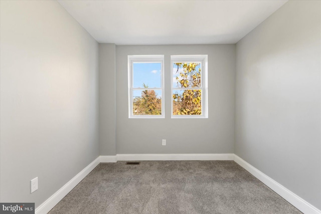 view of carpeted spare room