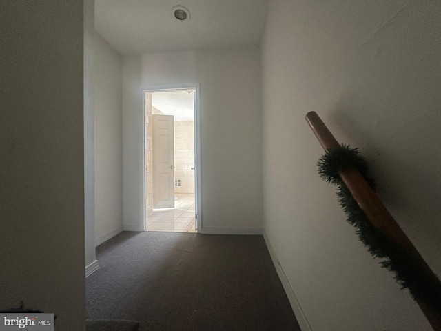 corridor with tile patterned floors