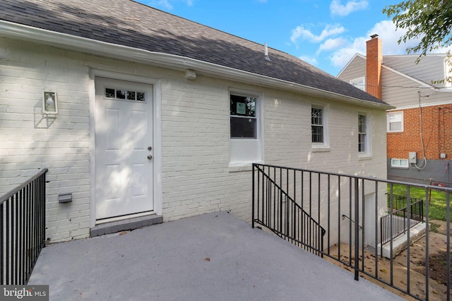 doorway to property with a patio