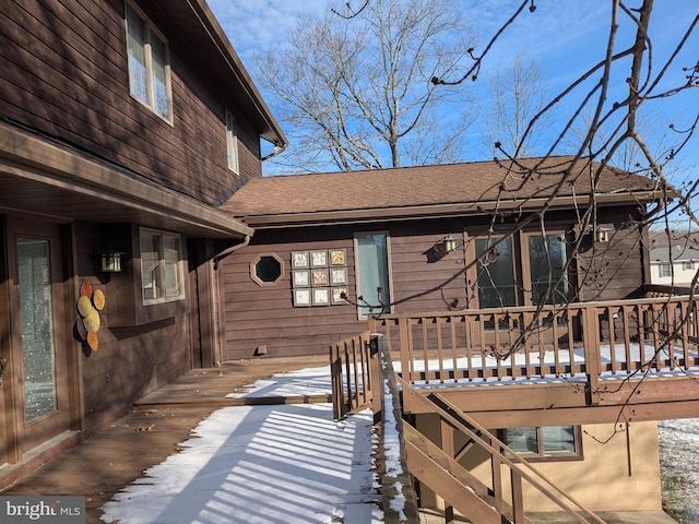 view of snow covered deck