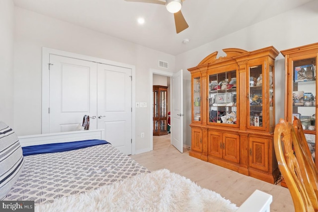 bedroom with a closet and ceiling fan