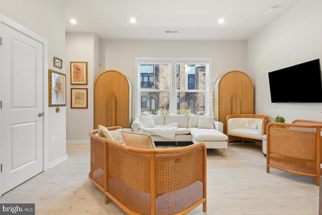 living room featuring light hardwood / wood-style floors