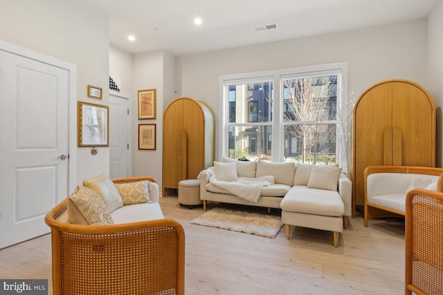 sitting room featuring light wood-type flooring