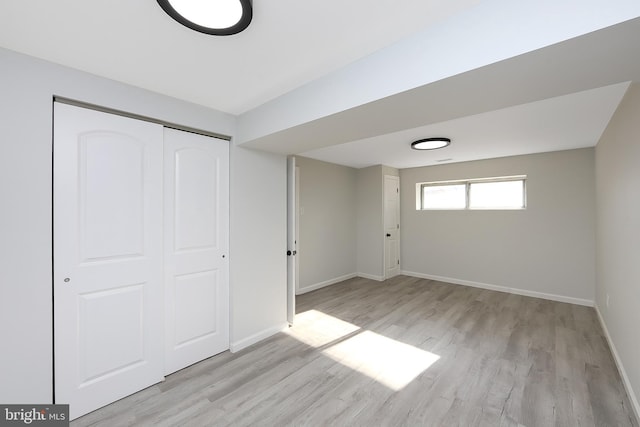 basement featuring light wood-type flooring