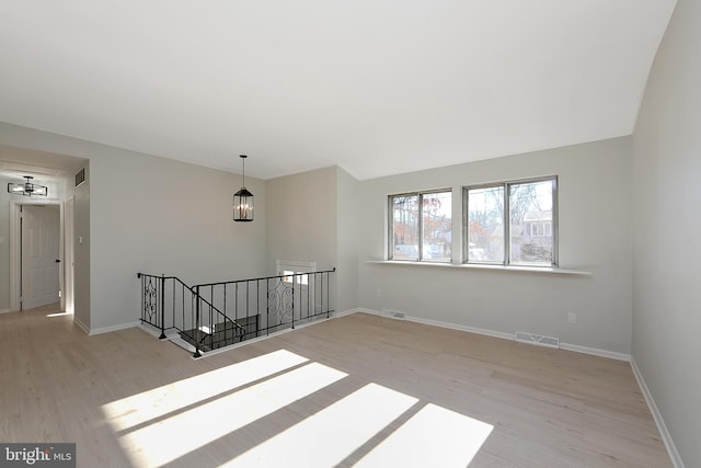 unfurnished room featuring light hardwood / wood-style flooring