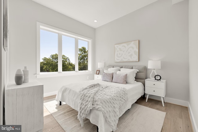 bedroom with light wood-type flooring