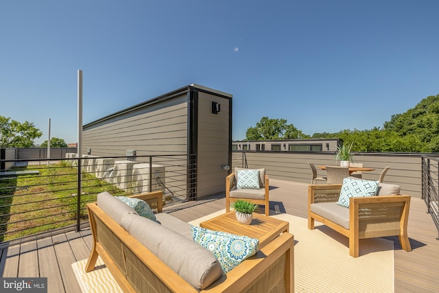 wooden terrace featuring outdoor lounge area