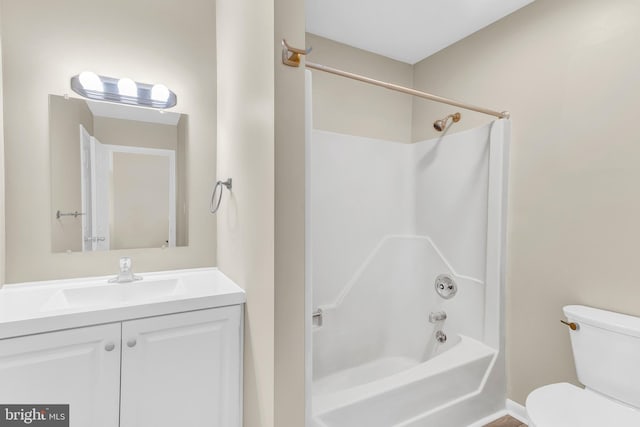 full bathroom with vanity, shower / bathtub combination, and toilet