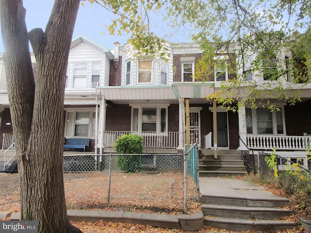 view of property with a porch