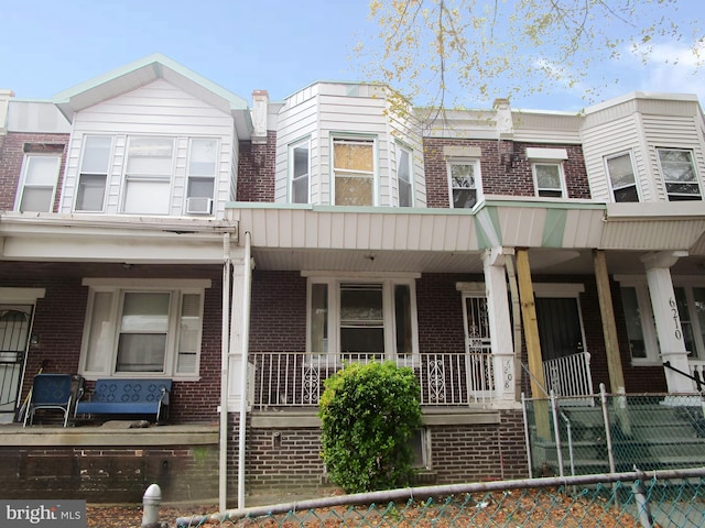 multi unit property featuring covered porch