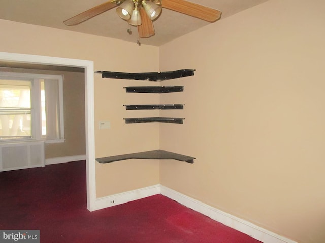 interior space featuring radiator heating unit and ceiling fan