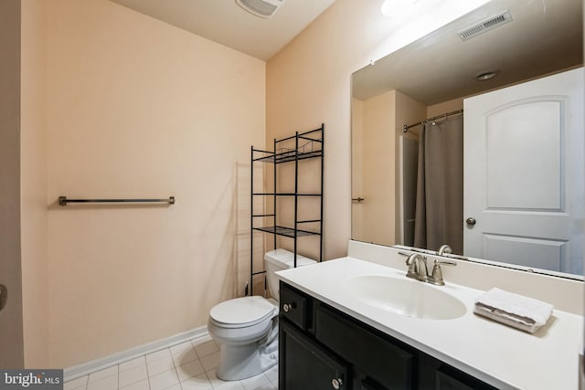 bathroom featuring tile patterned floors, vanity, toilet, and a shower with curtain