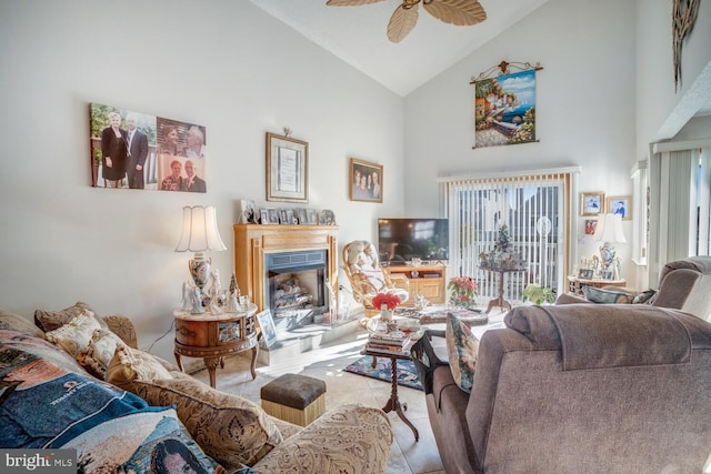 living room featuring ceiling fan, light tile patterned flooring, and high vaulted ceiling