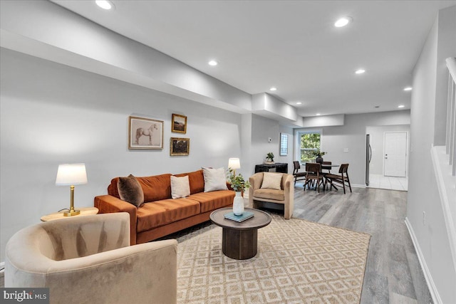 living room with hardwood / wood-style flooring