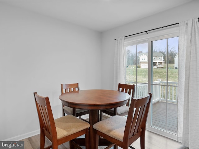 dining room featuring light hardwood / wood-style flooring