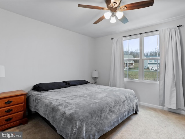 bedroom featuring carpet flooring and ceiling fan