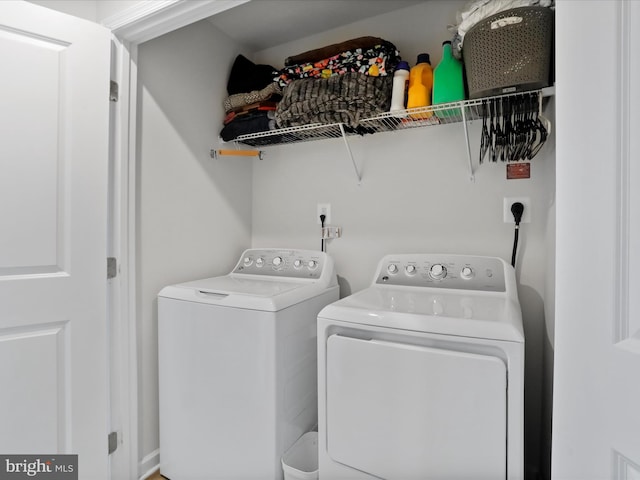 laundry room featuring washing machine and dryer