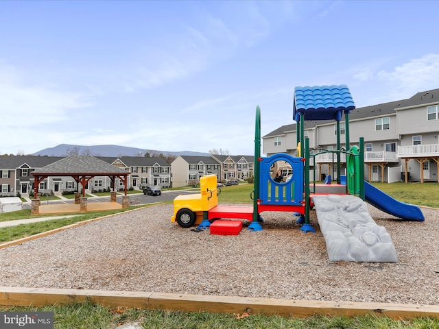 view of play area featuring a mountain view