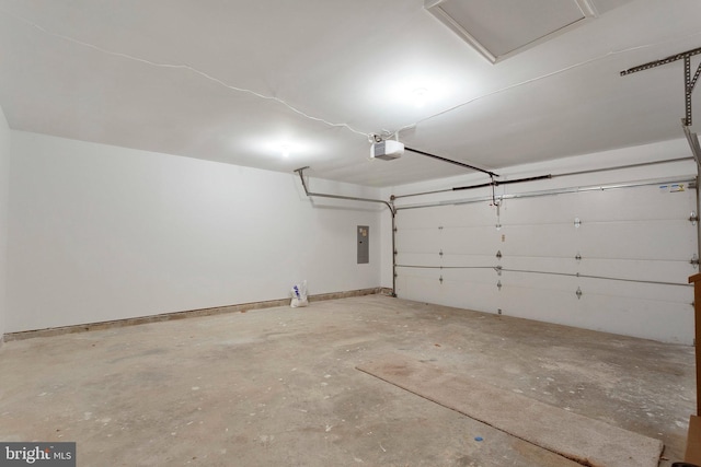 garage featuring a garage door opener and electric panel