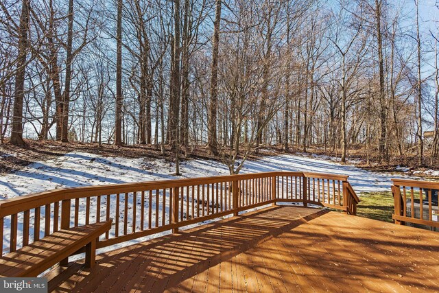 view of snow covered deck