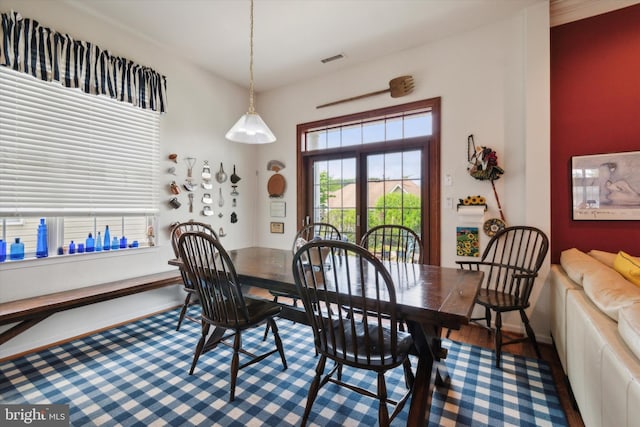 dining room featuring wood-type flooring