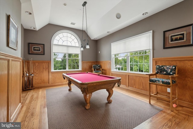 rec room with lofted ceiling, a healthy amount of sunlight, light wood-type flooring, and billiards