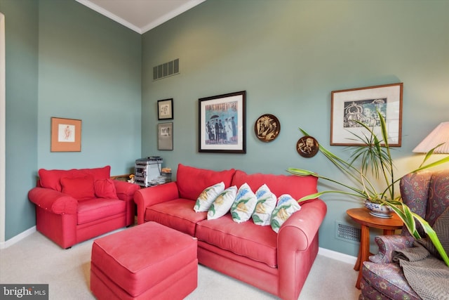 living room with light carpet and crown molding