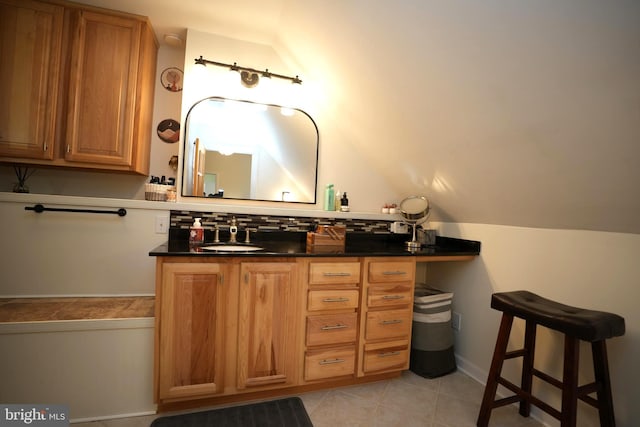 37978 George F Dr, Mechanicsville, MD 20659 - bathroom featuring vanity, vaulted ceiling, and tile patterned flooring