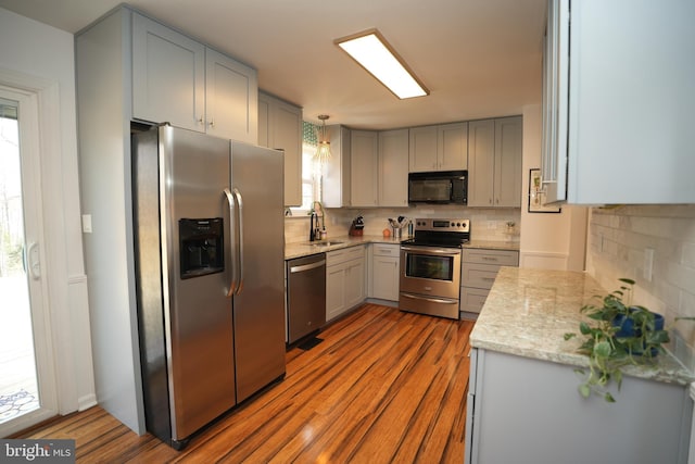 37978 George F Dr, Mechanicsville, MD 20659 - kitchen with a sink, backsplash, appliances with stainless steel finishes, and gray cabinetry
