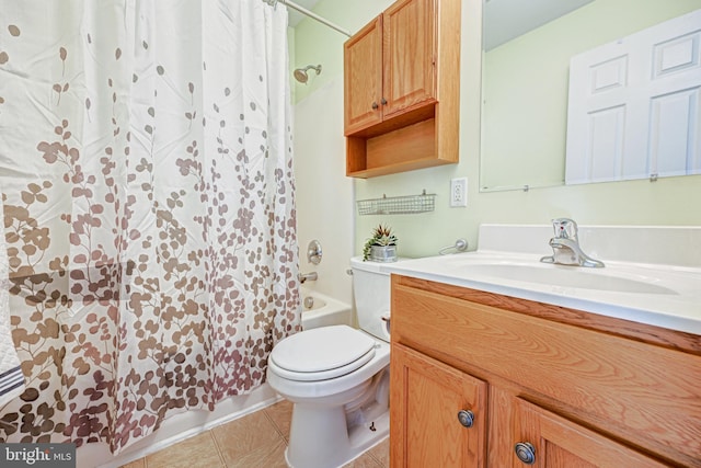 full bathroom with tile patterned flooring, vanity, toilet, and shower / bath combo