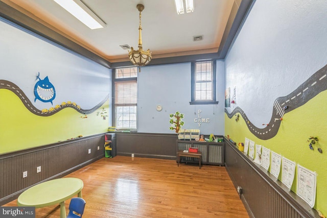 playroom featuring light wood-type flooring