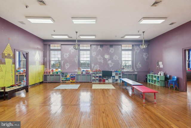 game room featuring hardwood / wood-style flooring