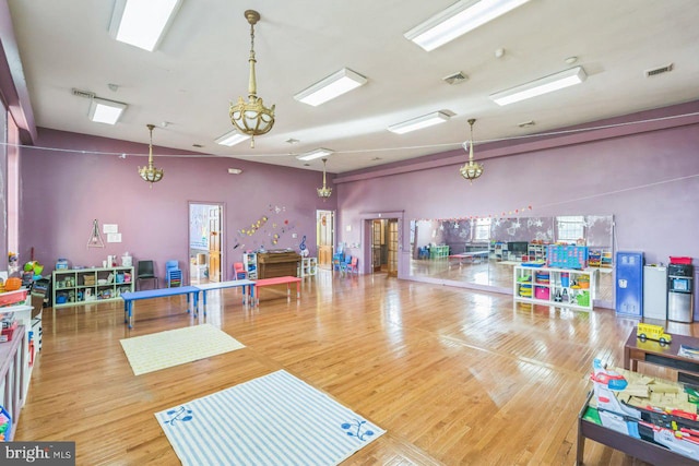 recreation room featuring hardwood / wood-style floors