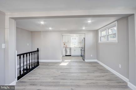 interior space with light hardwood / wood-style flooring