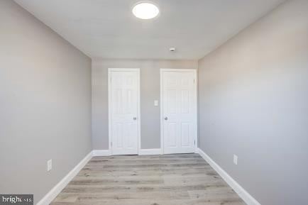 unfurnished bedroom featuring light hardwood / wood-style flooring