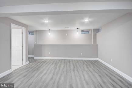 basement with light wood-type flooring