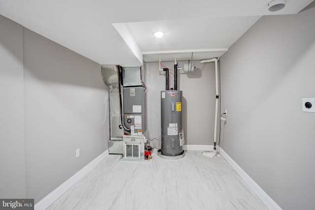 utilities featuring heating unit and electric water heater