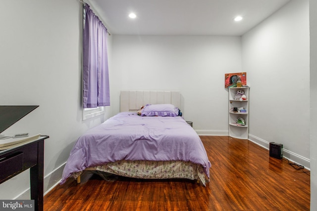 bedroom featuring hardwood / wood-style flooring